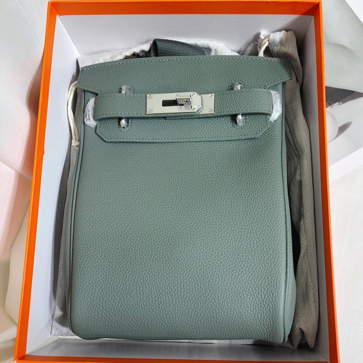 Togo Leather Chest Bag